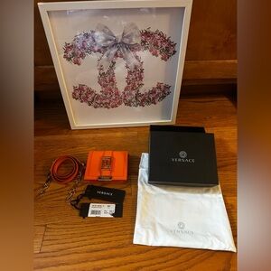 Versace Greca Goddess Wallet On Chain in Orange.